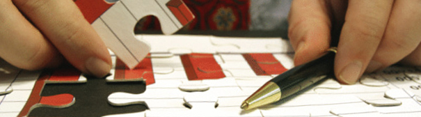 Photo of someone doing a puzzle