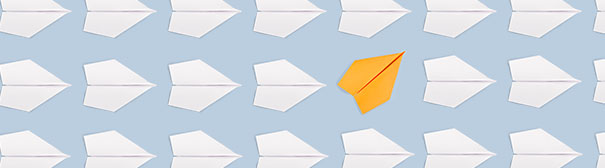 Paper airplanes in a row