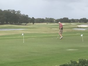 Photo of a man golfing